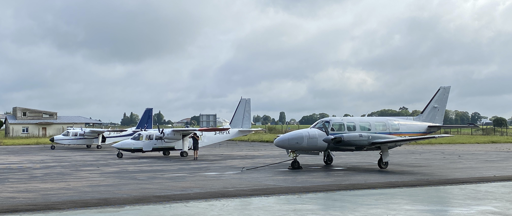 Three aircraft lined up on the flight line